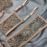 Wholesale Fancy Bra Panty Set in Beige Mesh with Embroidery Leg Ring Details